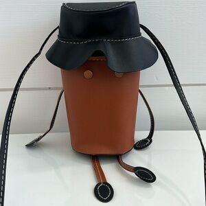 Crossbody bucket handbag. NEW